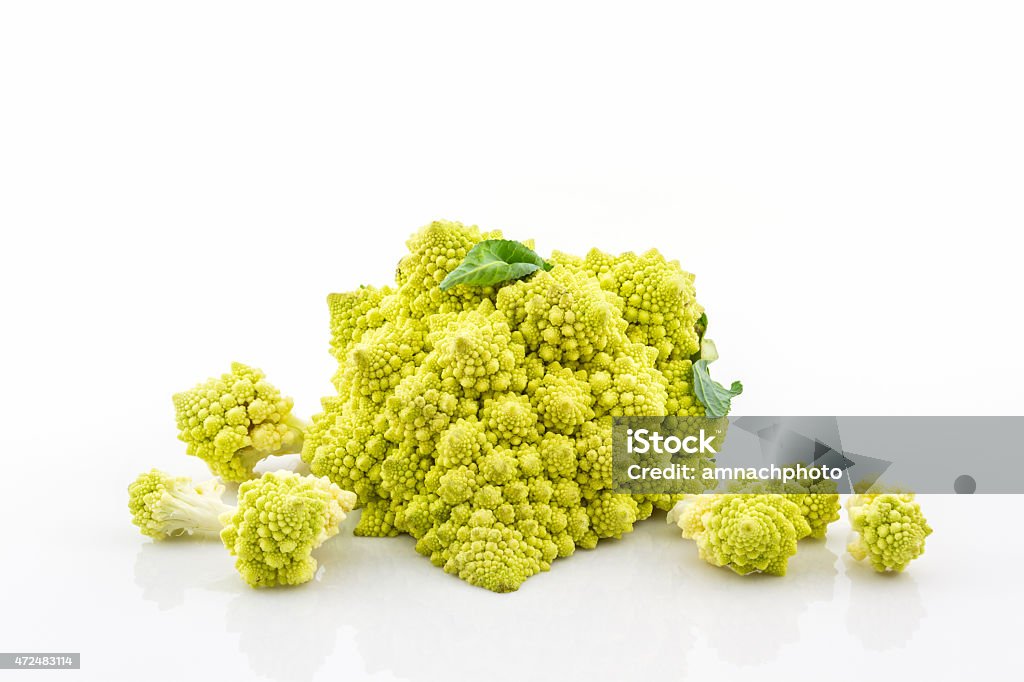 Fresh of green vegetable,Romanesco broccoli, Roman cauliflower. Fresh of green vegetable,Romanesco broccoli, Roman cauliflower on white background. 2015 Stock Photo