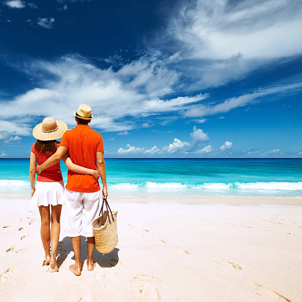 istock Couple on a beach at Seychelles 472483468