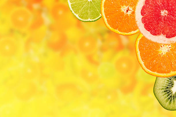 istock colorful fruits with background 472483738