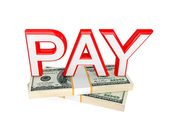 istock Word PAY and two packs of money. 472485380