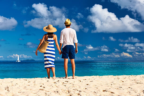 istock Couple on a beach at Seychelles 472485584
