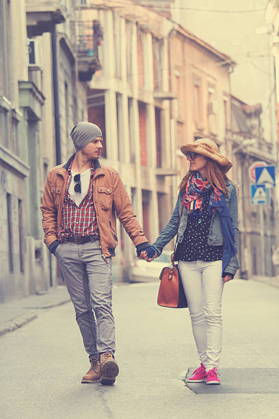 istock Couple enjoying outdoors in a urban surroundings. 472486786