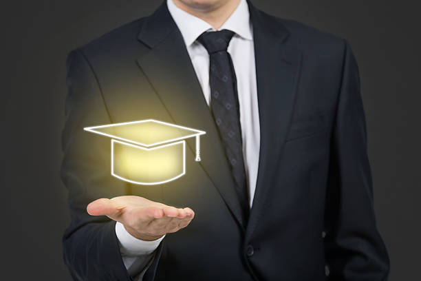 istock businessman holding bachelor ha 472487890