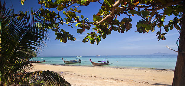 istock Longtail boats on the beautiful beach, Thailand 472488246