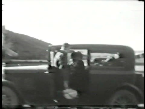 Two boys fight by car-From 1930's film