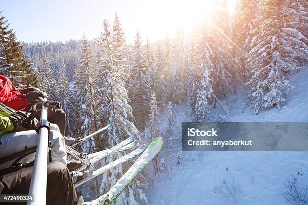 Family Sitting In Ski Lift Stock Photo - Download Image Now - Skiing, Ski, Family