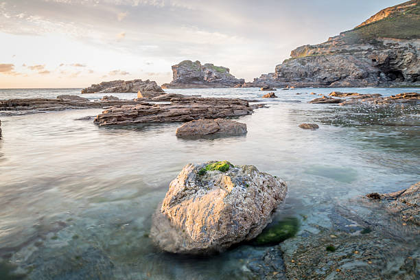 istock Beautiful sunset at trevellas porth in cornwall england uk. 472493196