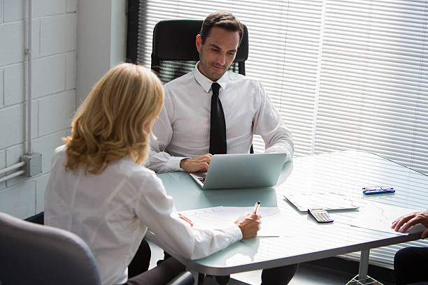 istock businesspeople having a meeting 472493240