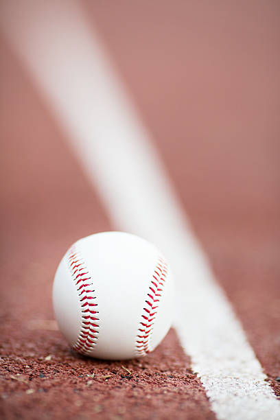 istock baseball on the Infield Chalk Line 472494518