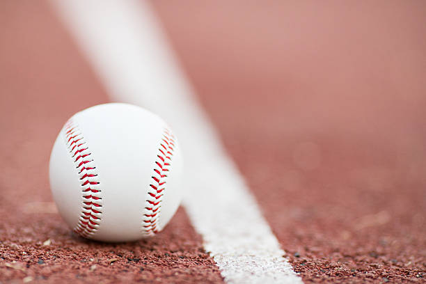 istock baseball on the Infield Chalk Line 472494526