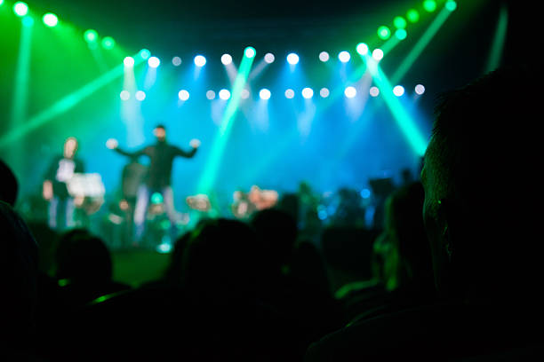 istock Audience watching the scene with the artists. 472495418