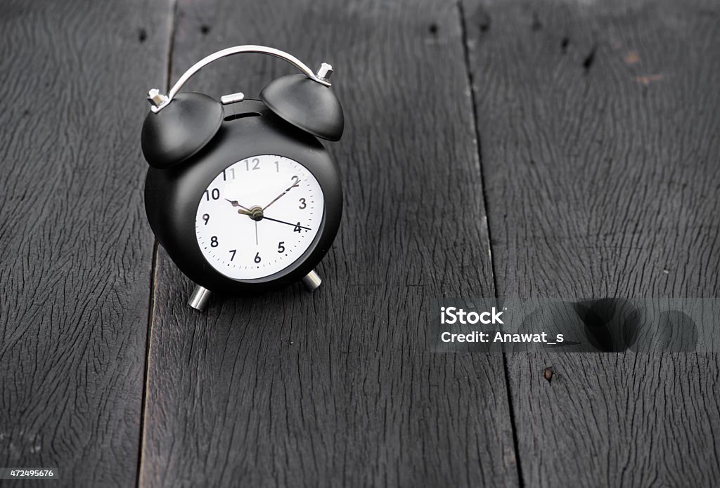 Vintage background with retro alarm clock on table 2015 Stock Photo