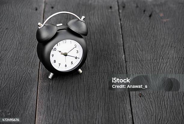 Vintage Background With Retro Alarm Clock On Table Stock Photo - Download Image Now - 2015, Alarm Clock, Alertness