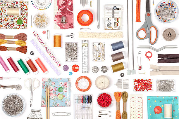 istock sewing and knitting on white background 472496886