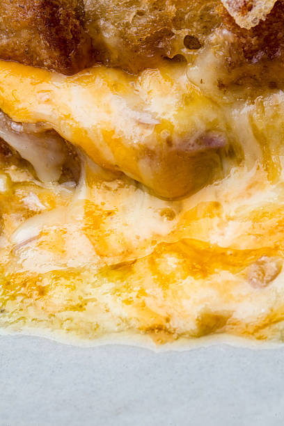 istock Fancy Grilled Cheese Sandwich on a Plate with Cheddar Melting 472498812