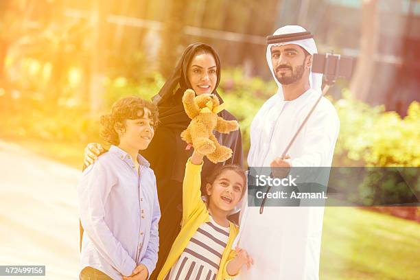 Taking A Family Portrait Stock Photo - Download Image Now - 2015, Abaya - Clothing, Adult