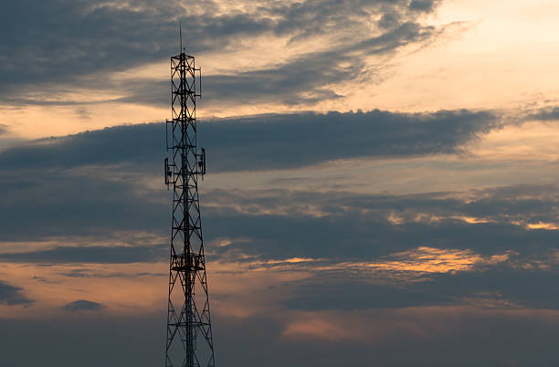 istock Twilight sky with Cell phone towers 472499182