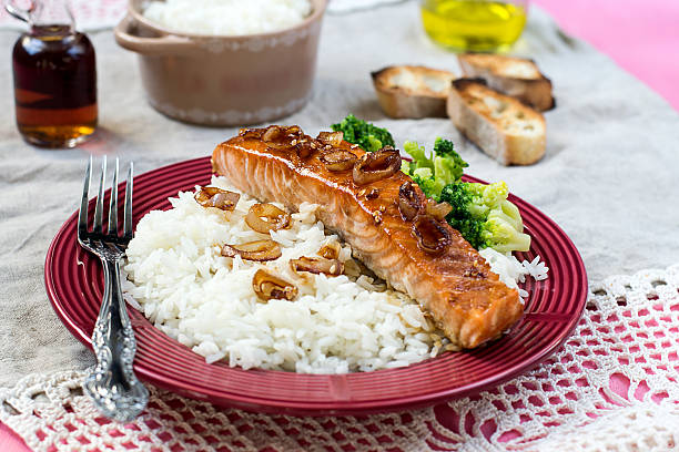 istock Maple glazed salmon with caramelized onions and rice 472501274