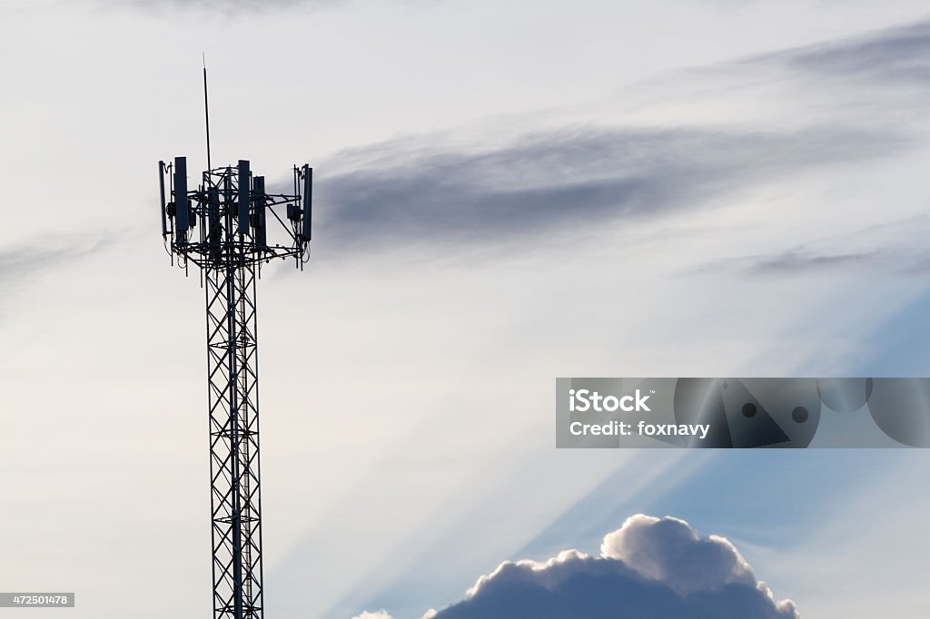 Tower The telecommunication broadcast tower in the cloudy day. 2015 Stock Photo