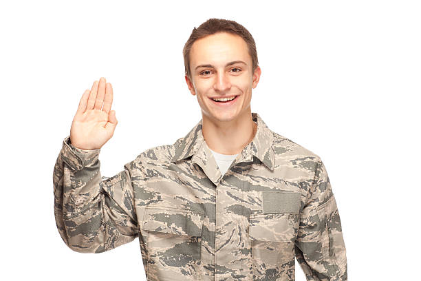 istock Happy air force airman with hand raised 472501752