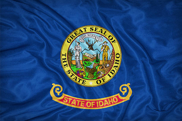 istock Idaho flag on fabric texture,retro vintage style 472502098