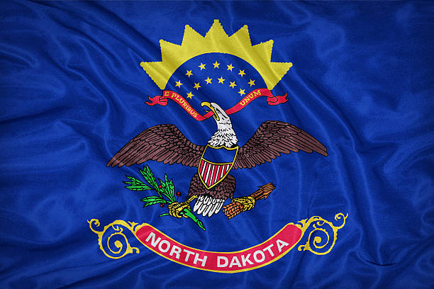 istock North Dakota flag on fabric texture,retro vintage style 472503814