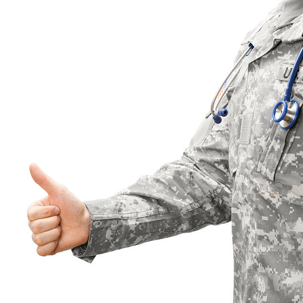 istock US Army doctor showing thumb up - studio shot 472504890