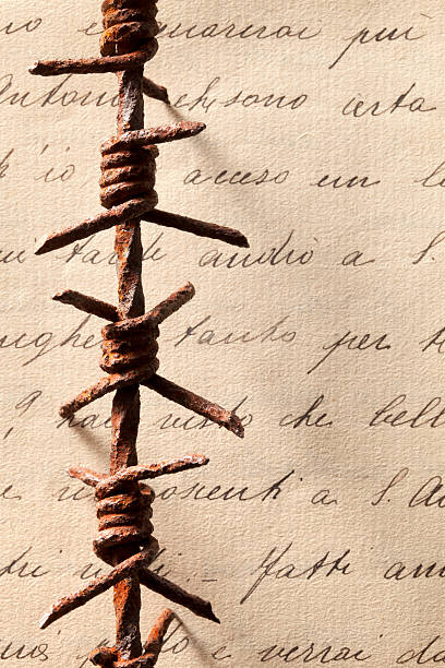Great War. Barbed wire on old letter. Great War. Barbed wire on old letter. 1918 stock pictures, royalty-free photos & images