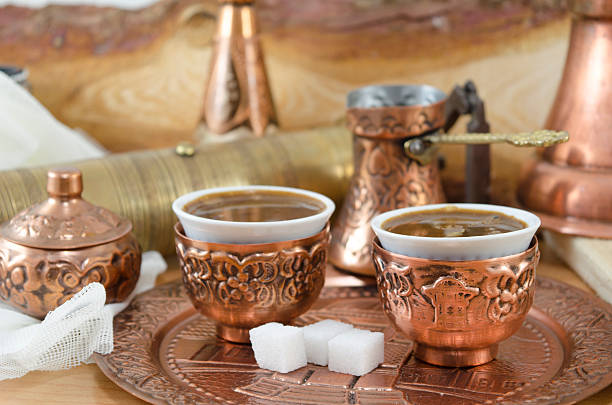 istock Copper plates and cups filled with coffee 472507692