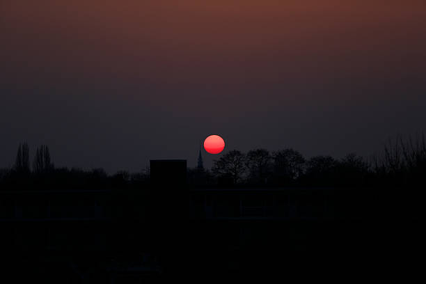 Sunset Sunset over the city of Amstelveen, The Netherlands.  arma-globalphotos stock pictures, royalty-free photos & images