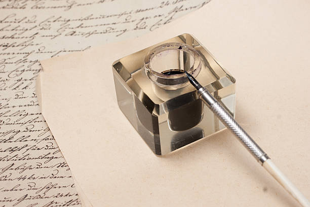 istock old papers and retro ink pen 472512826