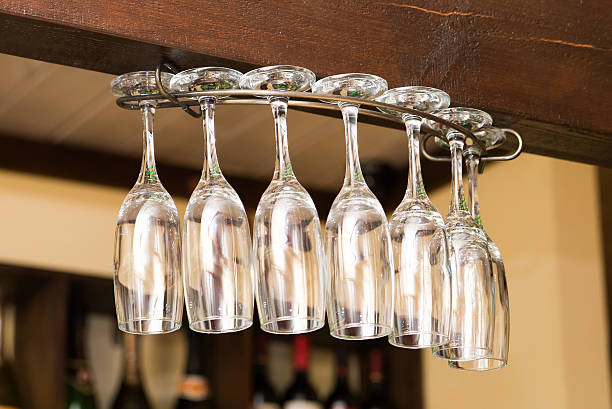 istock Set of emty glass hanging in restaurant 472521296