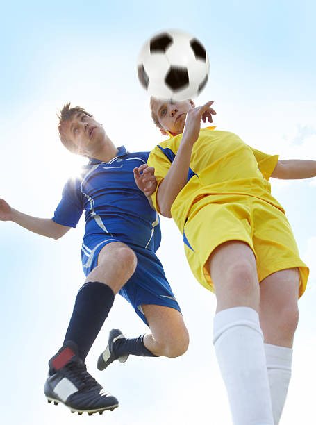 istock Footballers in jump 472521572