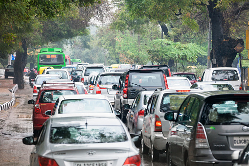 Busy road in modern Delhi, India.