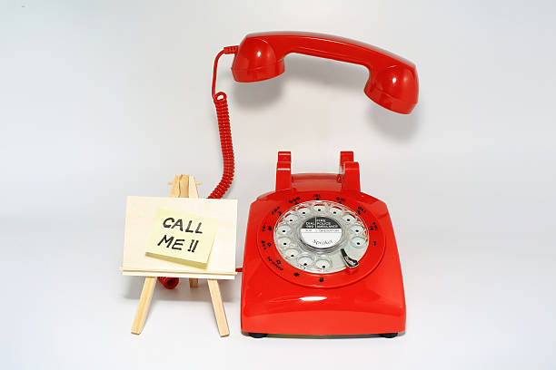 istock retro rotary dial phone closed with the memo call me 472522150