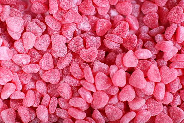 Photo of Gummy Candy Red Hearts Background
