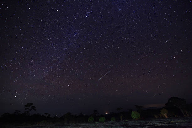 istock Geminid Meteor in the night sky 472526468