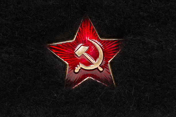 Russian Red Star with Hammer and Sickle on Fur Russian Red Star with Hammer and Sickle on Fur communism stock pictures, royalty-free photos & images