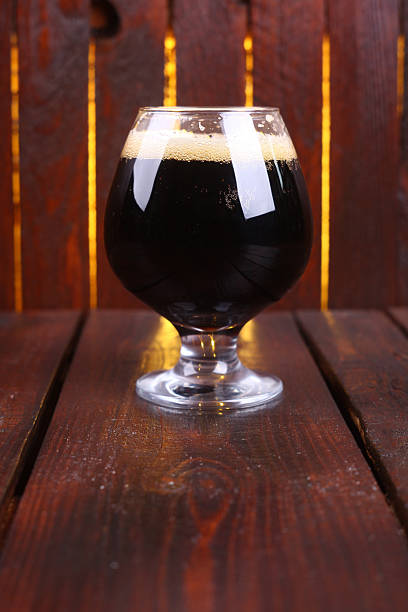 istock Glass of dark stout 472532144