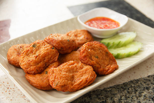 Thai Food Fried Fish Cake with sweet and sour sauce.