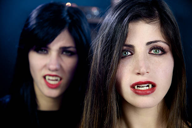 Close-up grunge portrait of young brunette woman in depression. Female  in disbelief looking at the camera