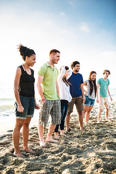istock friends togetherness at the beach 472534482