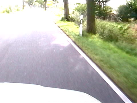 Driving a car in countryside road