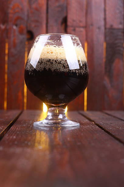 istock Glass of dark stout 472535022
