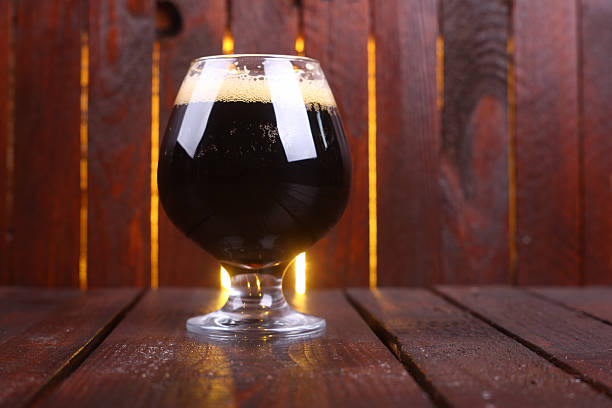 istock Glass of dark stout 472535042