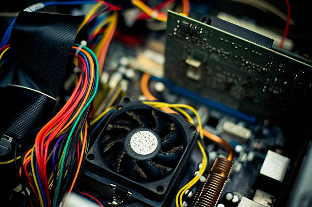 istock Old dusty pc motherboard fan vintage color effect 472541574