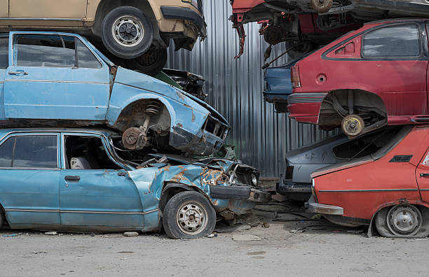istock Wrecked Cars Stored at a Junkyard 472541830