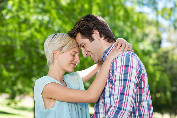 istock Cute couple at the park 472542788