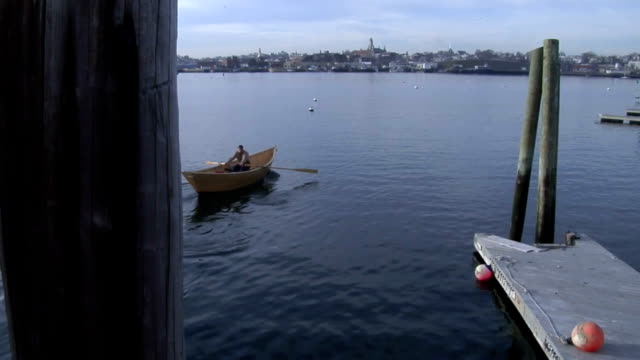 Man Rowing a Dory