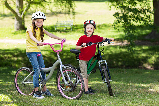 istock Happy siblings on their bike 472546524